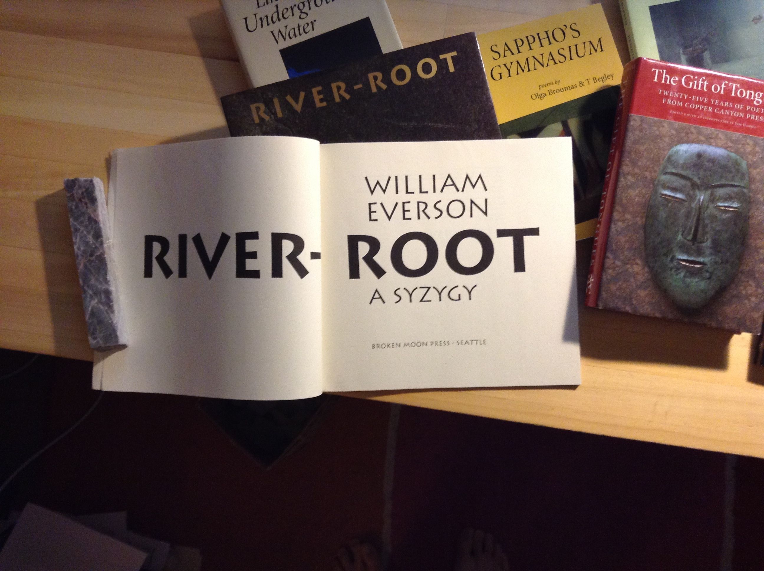 Carol Twombly’s Lithos is featured in this Broken Moon Press edition of William Everson’s “River-Root,” designed by John D. Berry.