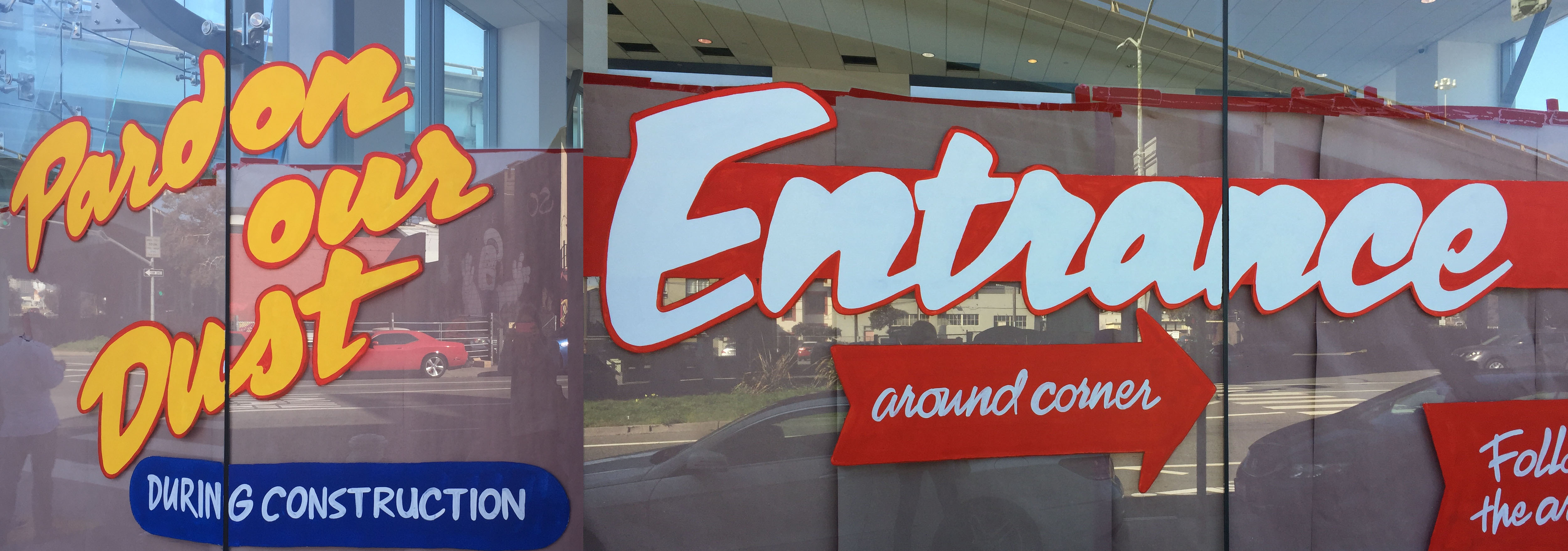 Painted lettering on the car dealership windows